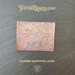 Copper plate with leaf pattern design.