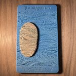 Textured leaf pattern on blue background.