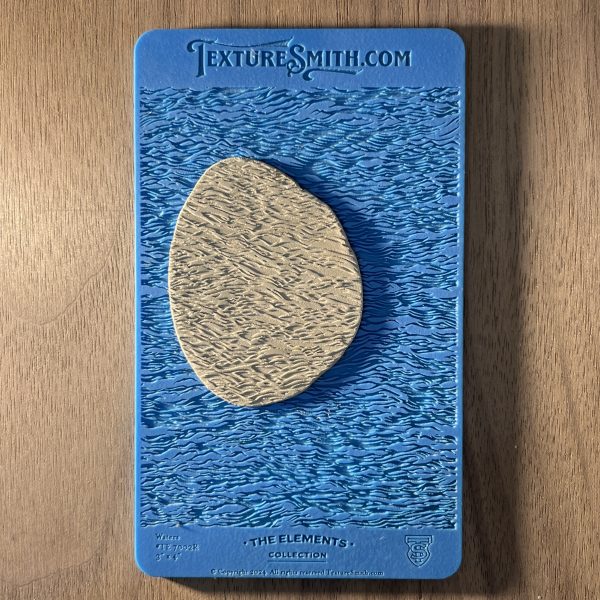 Textured stone on blue textured background.