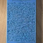 Blue textured sample on wooden surface.