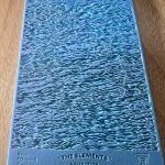 Blue textured surface with wavy water pattern.