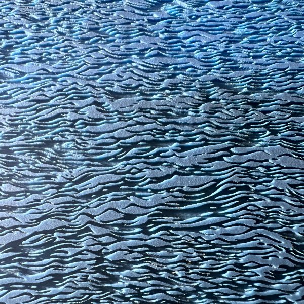 Aerial view of oceanic sand patterns.