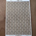 Geometric patterned texture sample on a card.