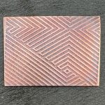 Geometric pattern on a rectangular surface.