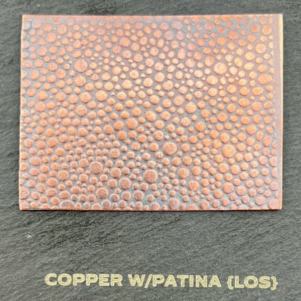 Copper sheet with textured patina finish.
