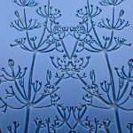 Blue floral pattern with symmetrical abstract design.