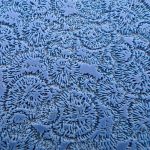 Blue textured pattern resembling abstract frost.