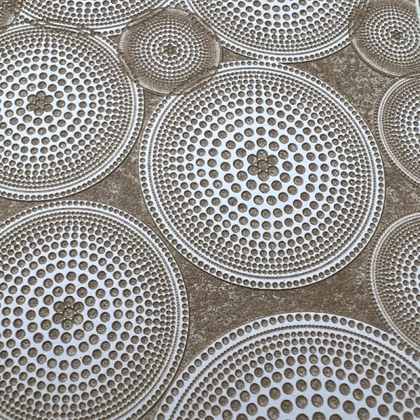 Circular patterns with intricate dot designs.