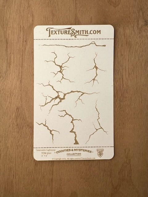 Sample card showing various crack textures for surface design.