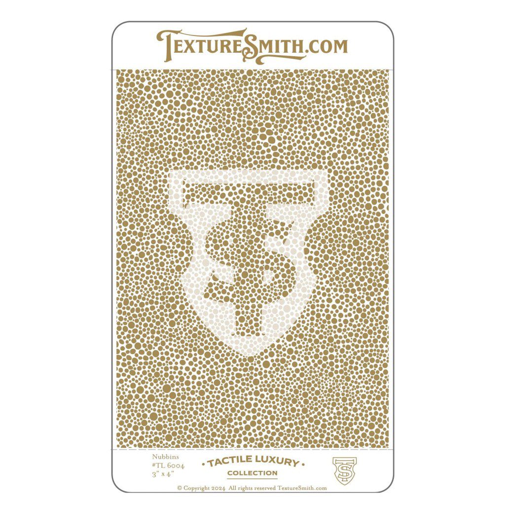 Close-up of a textured, speckled surface sample on a card.