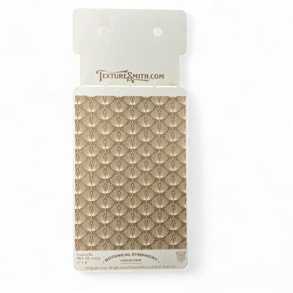 A pack of decorative gold adhesive dots.