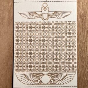 Ancient Egyptian-themed patterned artwork with scarab beetles and hieroglyphic motifs.