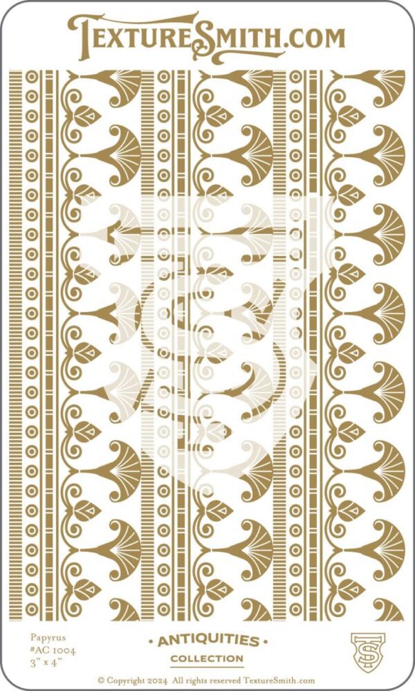 Intricate gold and white patterned fabric with symmetrical floral and geometric designs.