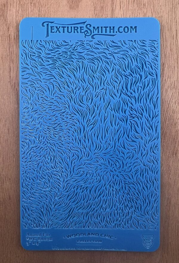 Blue abstract painting with flowing, curved lines creating a textured effect.