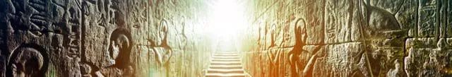 Illuminated stone steps leading to a bright, glowing exit.