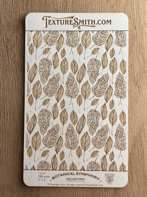 Notebook with a brown leaf pattern on the cover.