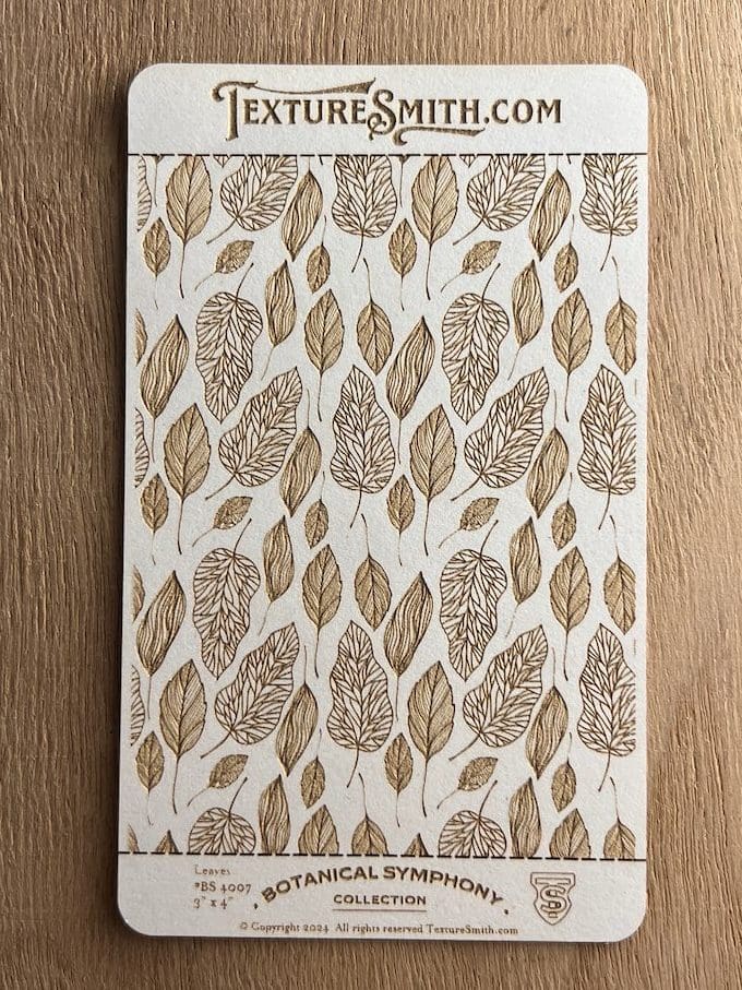 Notebook with a brown leaf pattern on the cover.