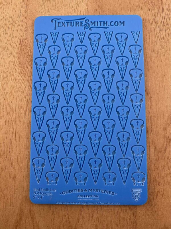 Blue book cover with repeated lightbulb illustrations and text at bottom.