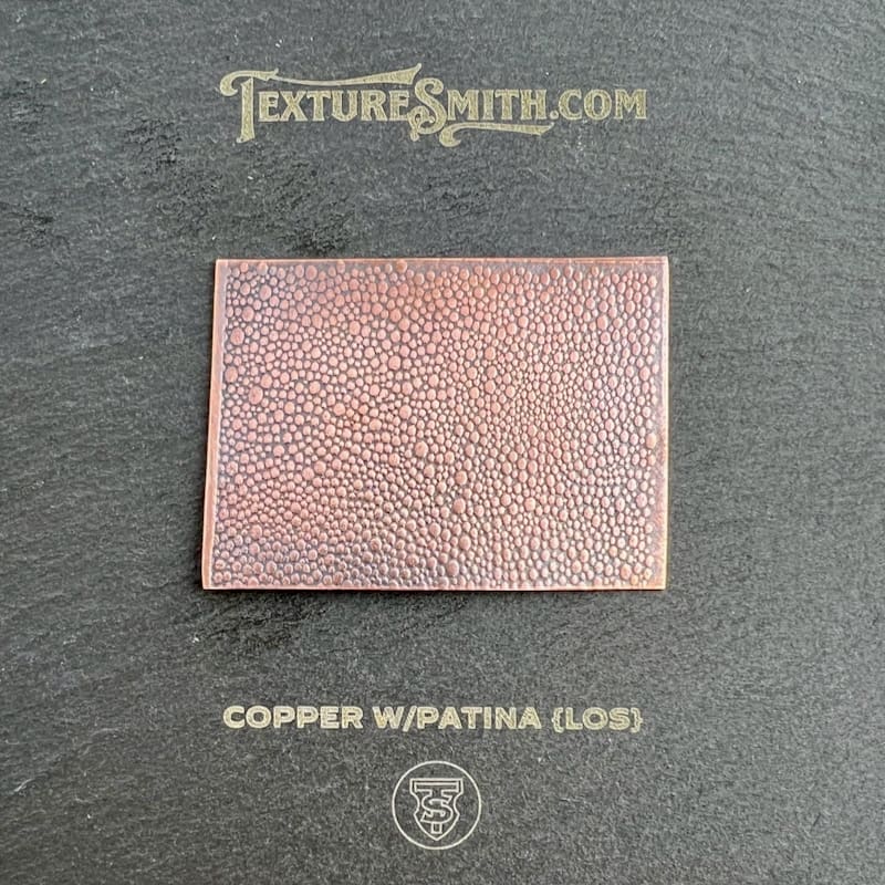 Copper plate with a wpatina gloss texture.