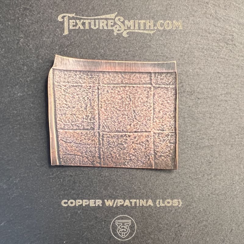 Copper square with patina and a glossy finish.