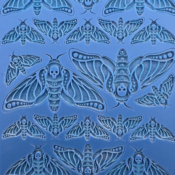 Intricately detailed blue bat motifs with ornate patterns.