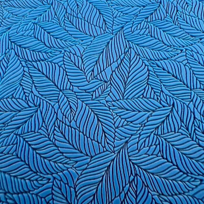Intricate blue leaf pattern with detailed vein lines.