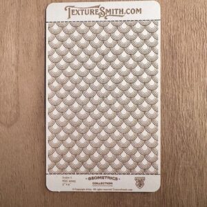 Embossed card with diamond pattern texture, labeled 'Textile Smith'.