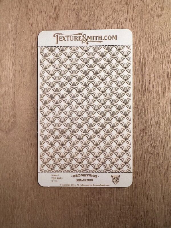 Embossed card with diamond pattern texture, labeled 'Textile Smith'.