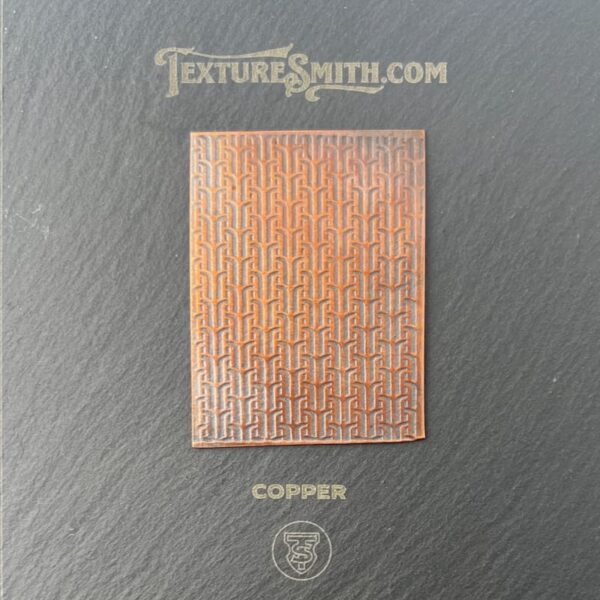 A textured copper plate on a dark background with "TextureSmith.com" logo.