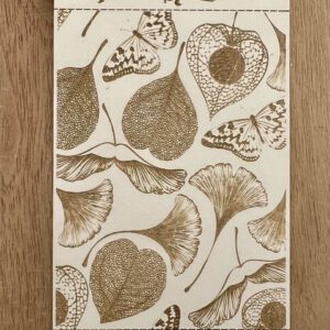 Artistic drawing of various fruits and flowers in sepia tones.