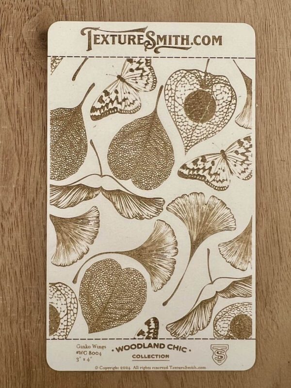 Artistic drawing of various fruits and flowers in sepia tones.