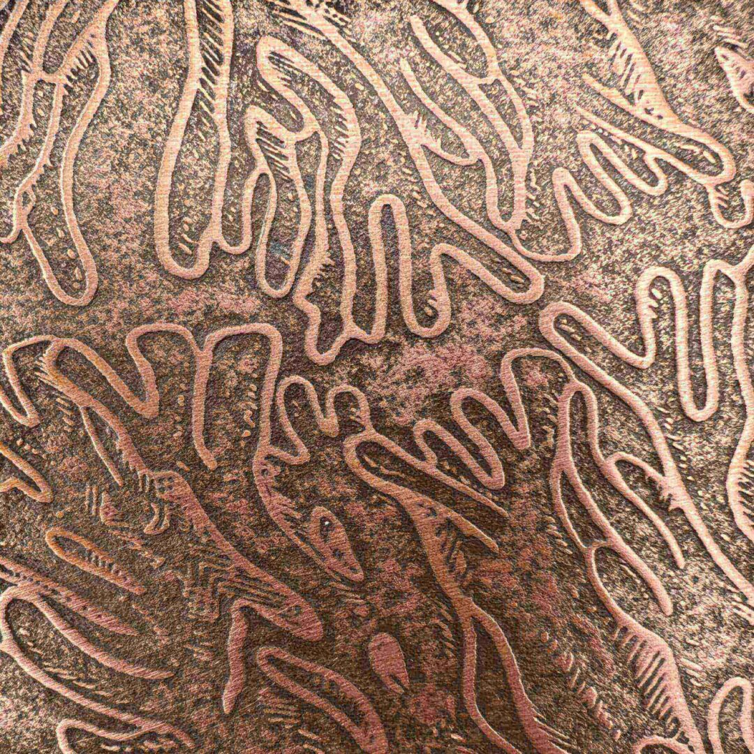 Close-up of an intricate, abstract pattern with organic, hand-like shapes in earthy tones.