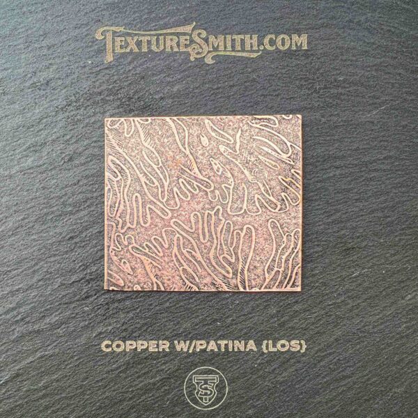 Glossy copper swpatina texture with intricate patterns.