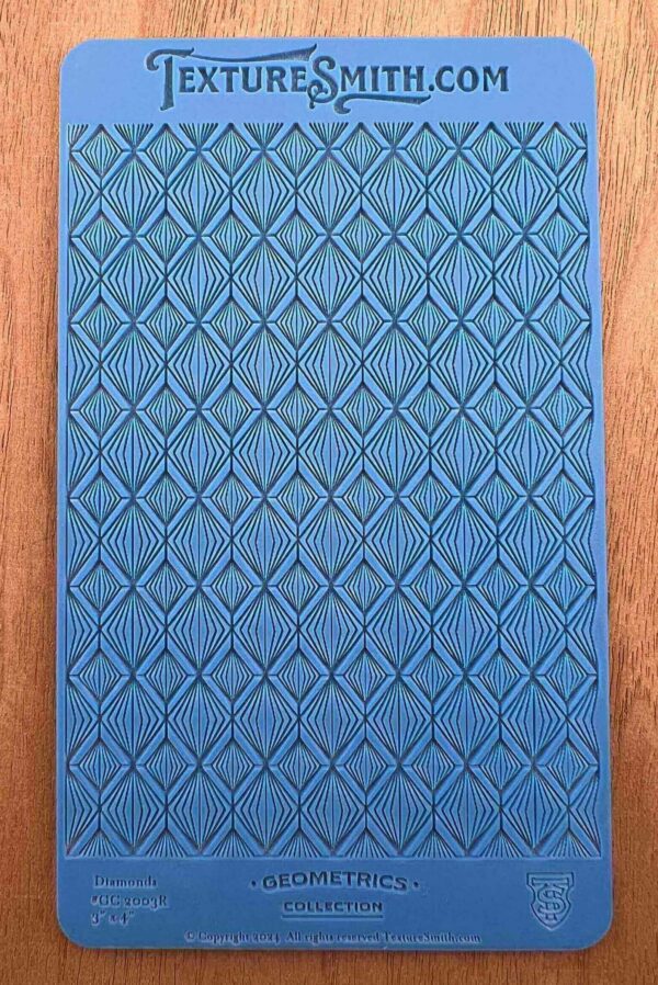 Blue textured mat with diamond patterns on a wooden floor.