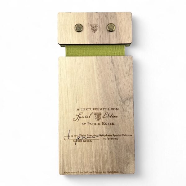 Wooden plaque with engraved text and three small wooden pegs on top.