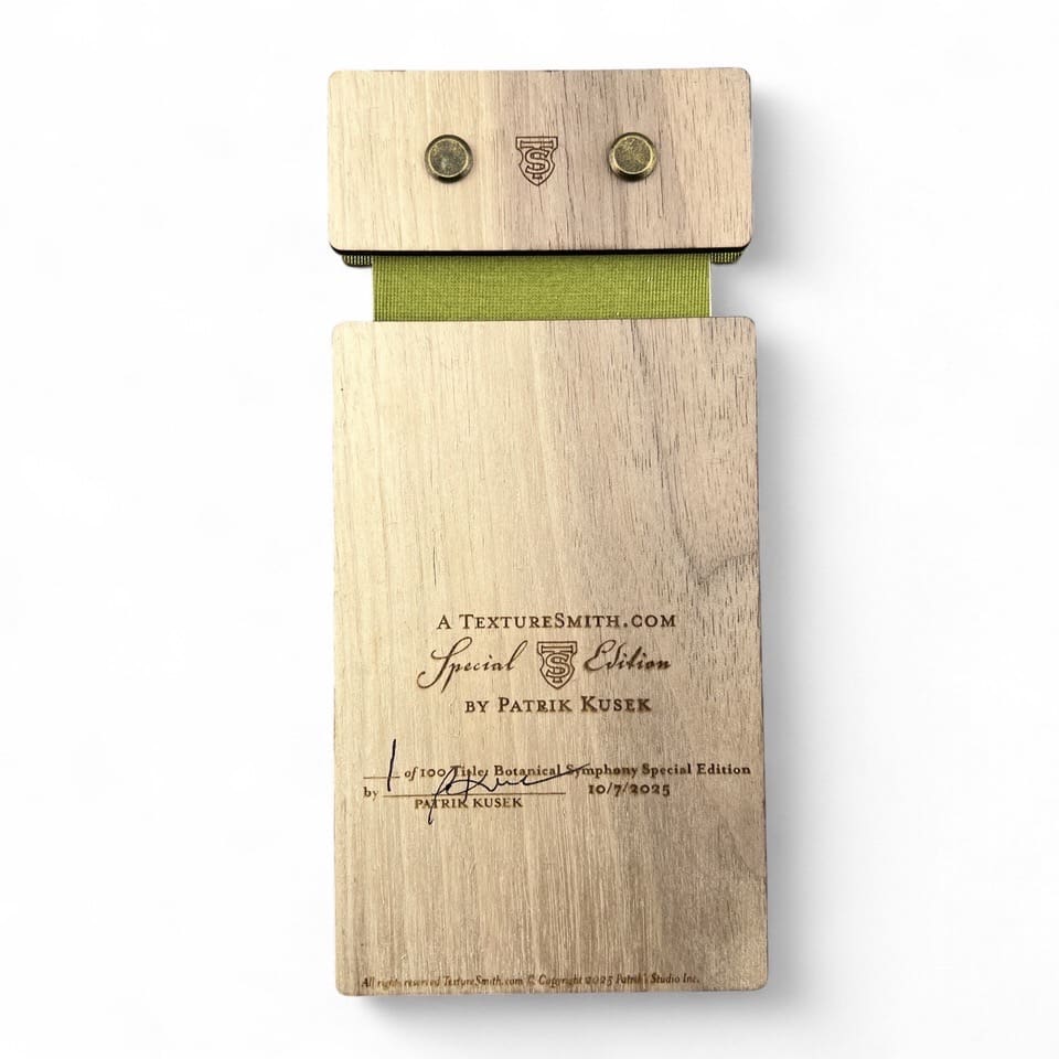 Wooden plaque with engraved text and three small wooden pegs on top.