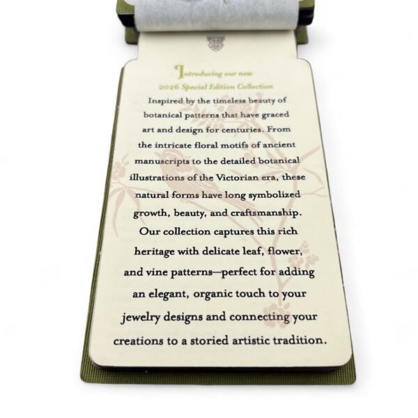 A vintage handwritten document on aged paper with a fountain pen.