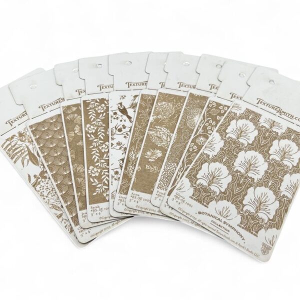 A fanned-out set of tarot cards with intricate designs.