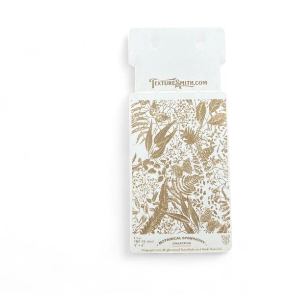 Elegant white and gold decorative paper packaging with intricate floral patterns.