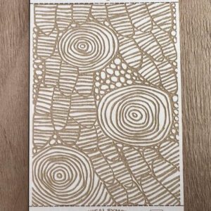 Abstract artwork with concentric circles and textured patterns in gold on white.