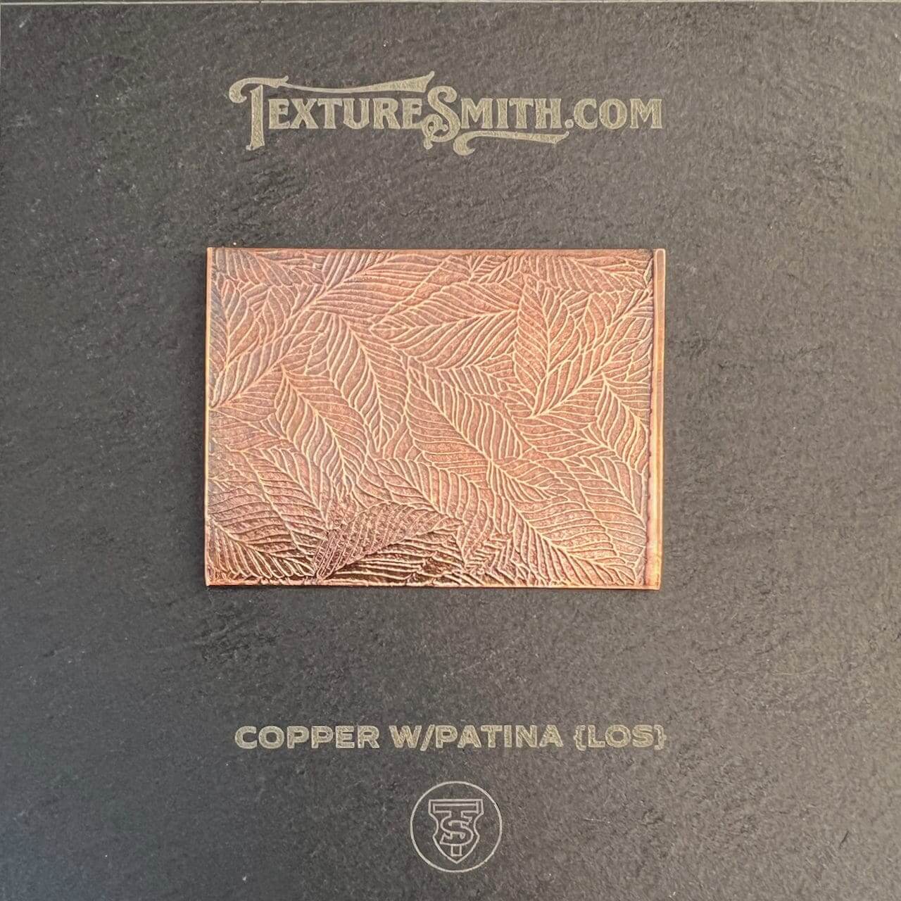 A copper-colored textured metal sheet with a patina gloss finish.