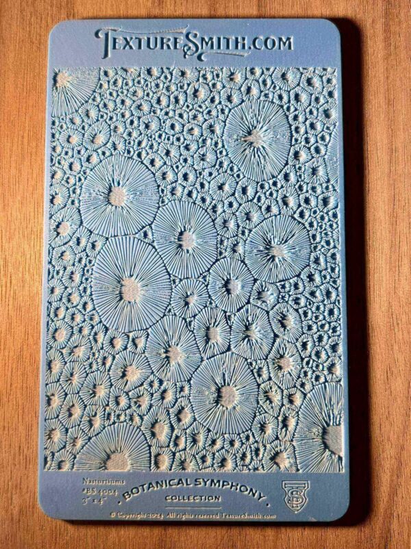 Intricately carved wooden panel with circular patterns.