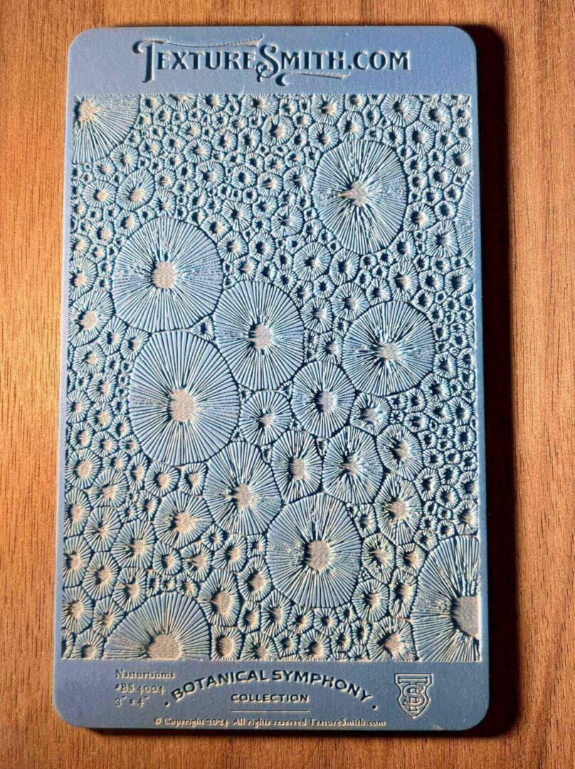 Intricately carved wooden panel with circular patterns.