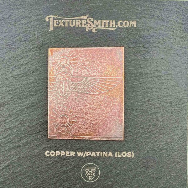Copper sheet with a glossy patina texture.