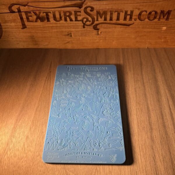 A blue hardcover book on a wooden table with a wooden backdrop.