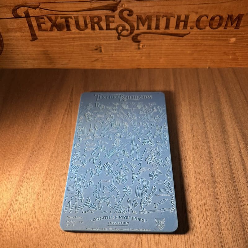 A blue hardcover book on a wooden table with a wooden backdrop.