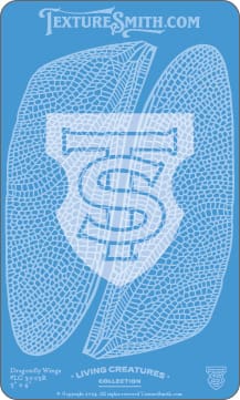 Close-up of a detailed textile pattern with stylized letters 'T' and 'S'.