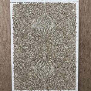 Beige and brown patterned rug on wooden floor.
