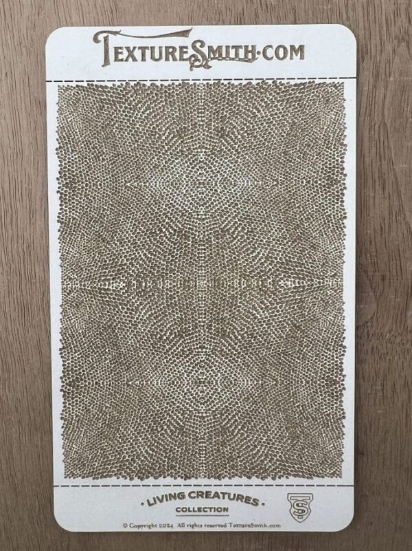 Beige and brown patterned rug on wooden floor.
