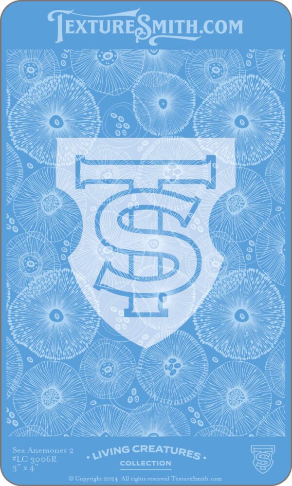 Intricate blue and white emblem with interlocking letters and floral patterns.